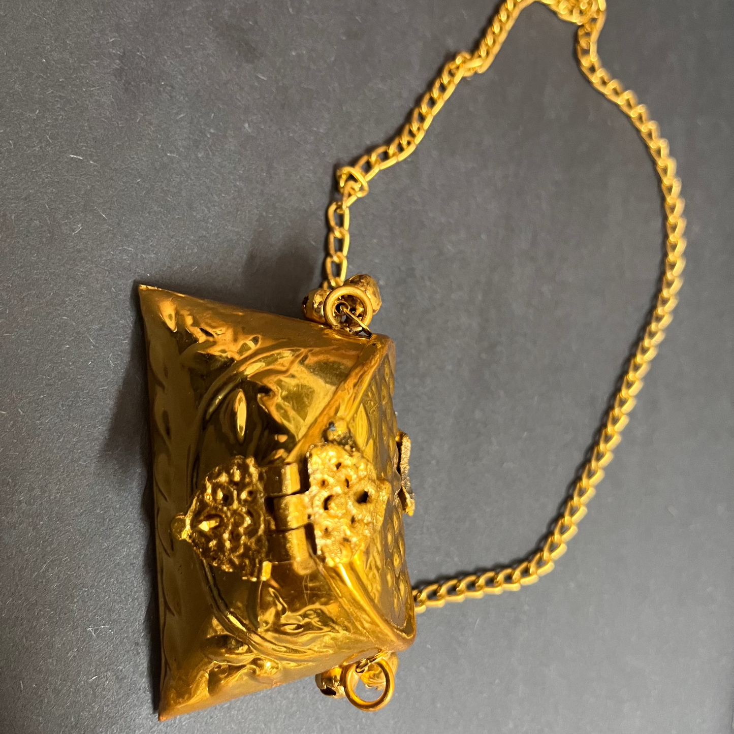 Urban chic gold small size clutch to enhance your outfit